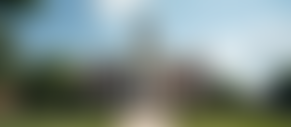 Wide angle view of a Maryland courthouse exterior under a clear sky