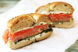 Smoked salmon filled bagel with cream cheese.