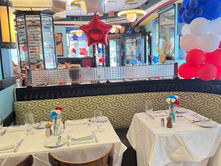 Dining room decorated to celebrate France's Bastille Day.