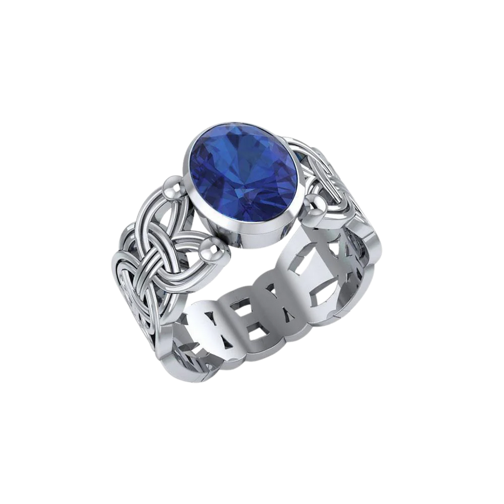 Sterling silver ring with oval blue gemstone and intricate Celtic knotwork design.