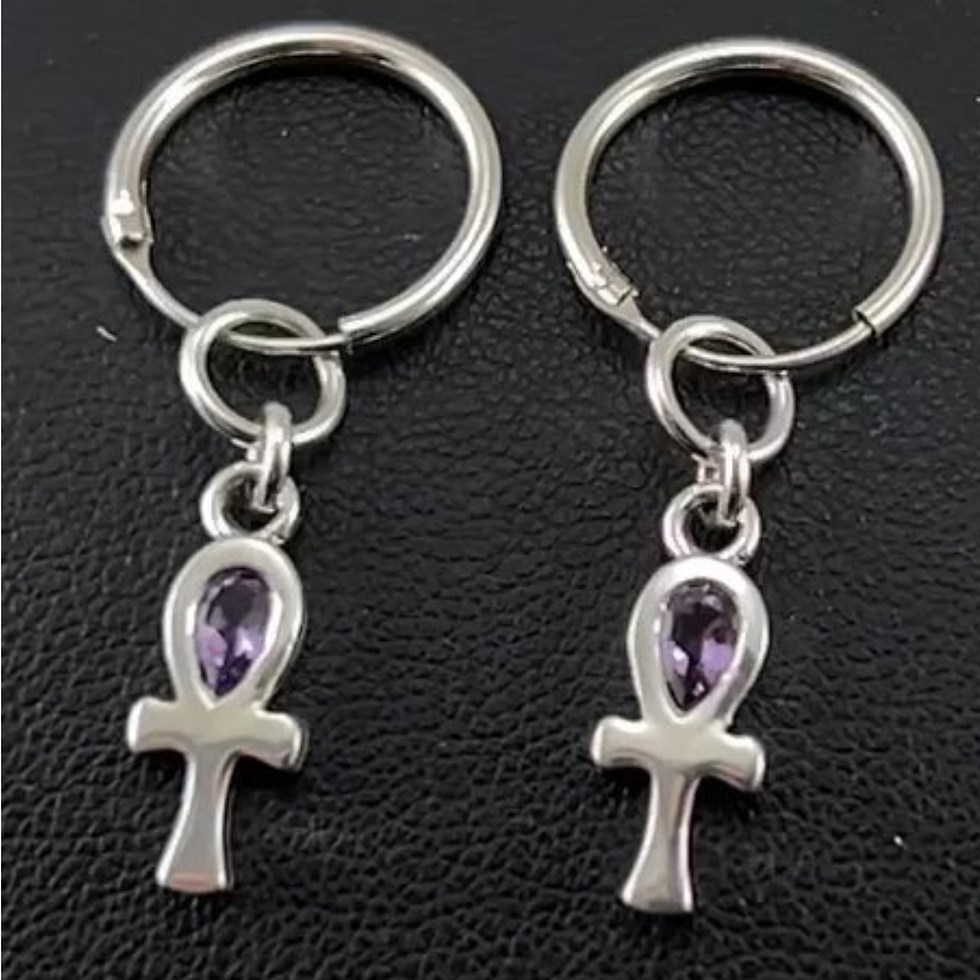 Thumbnail: Two sterling silver ankh pendants with purple gemstones on hoop earrings.