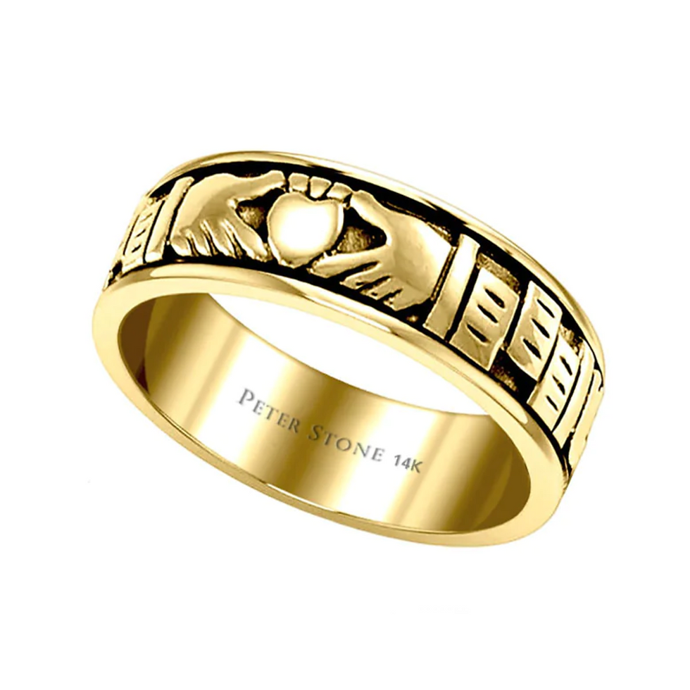 Gold Claddagh ring with celtic design, "PETER STONE 14K" engraved.