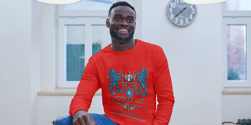 थंबनेल: Smiling male wearing red H2H NOTARY, LLC sweater, looking happy.