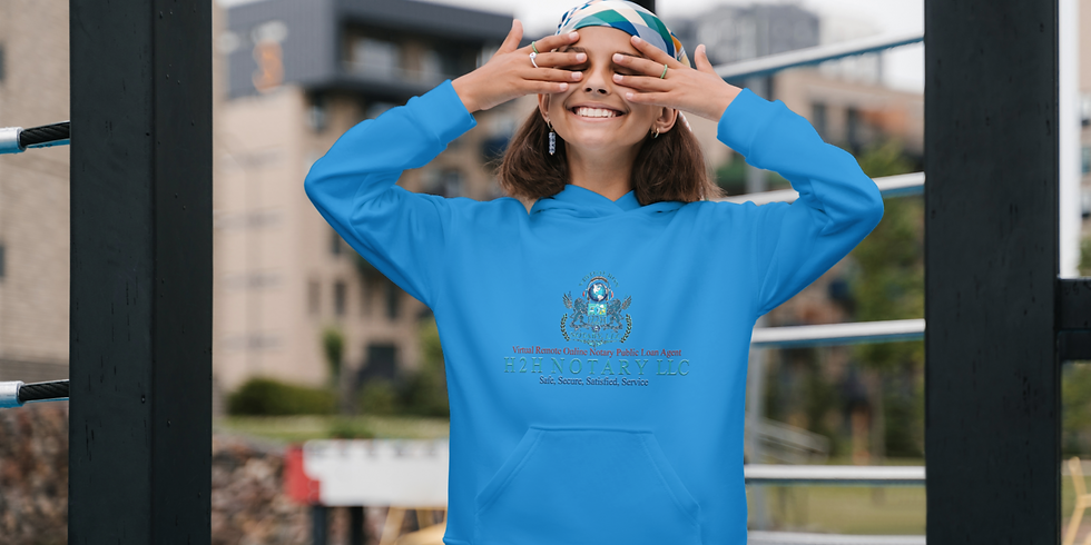 Miniatura: Smiling female with H2H NOTARY LLC SWEATER HOOD, covering eyes playfully.