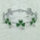 Thumbnail: Metallic silver bracelet featuring bright green shamrock links.