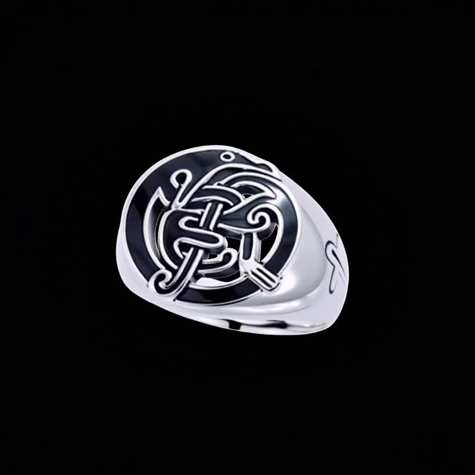 Thumbnail: Silver ring with intricate Celtic knot bird design on black background.