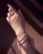 beautiful model wearing white gold diamond ring and tinnes bracelets..jpg