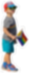 A young child holding a pride flag in summer gear.