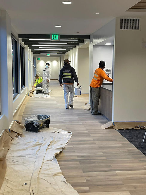 Painting interior walls in commercial building