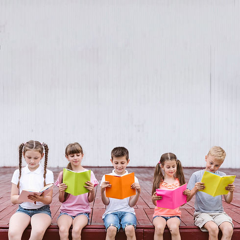 kids-reading-books-with-copy-space.jpg