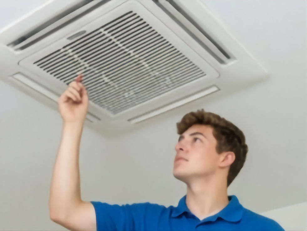 Eye-level view of a technician inspecting an HVAC unit outside a residential home in Tracy CA