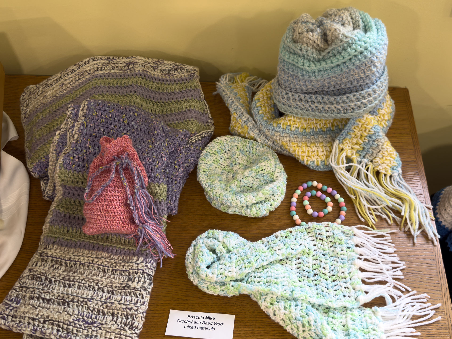 Crocheted hats, scarves, and bracelets