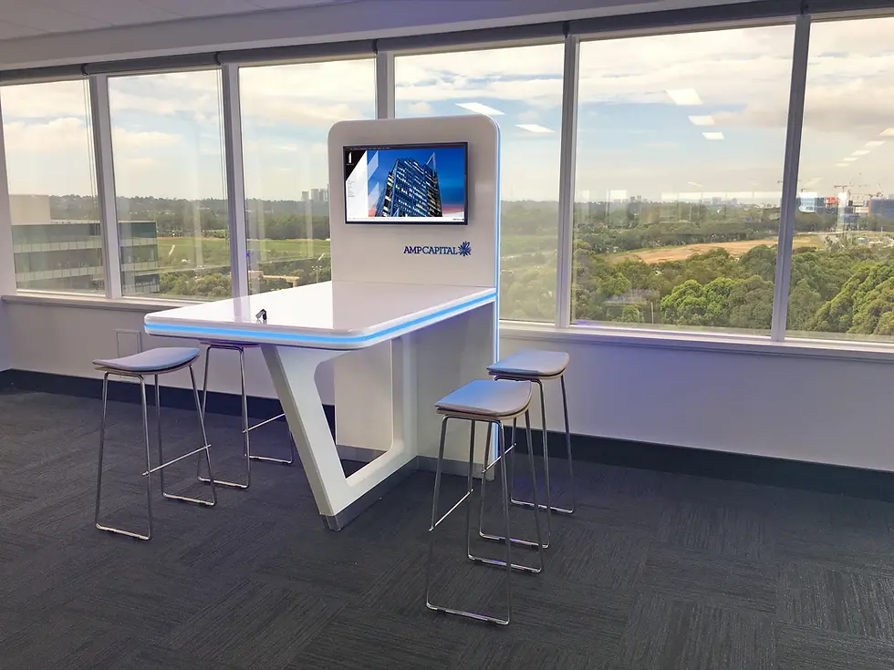 Portable tenancy conference table designed for AMP, set up in a commercial office space