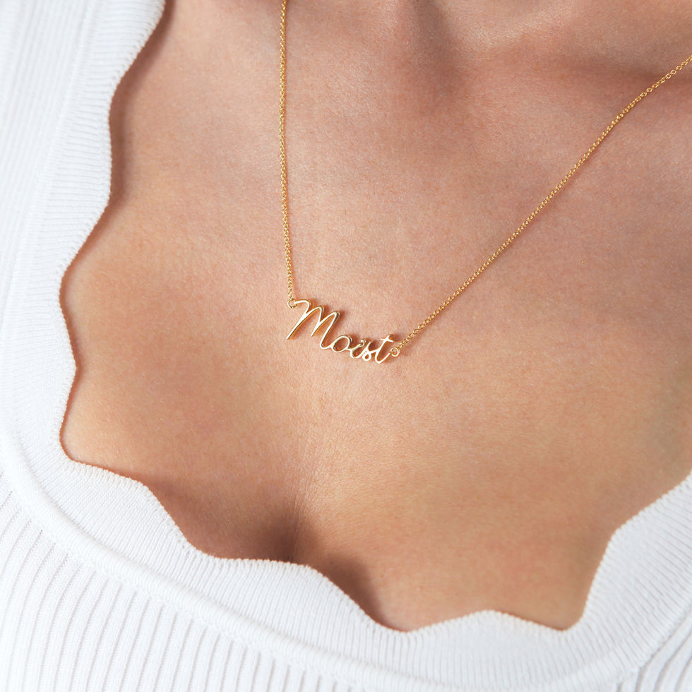 Woman wearing Moist in gold