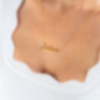 Woman wearing Soltera in gold
