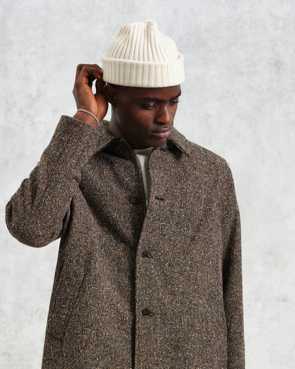 Wax London Belvoir Ecru Wool Fisherman Beanie on model front detail