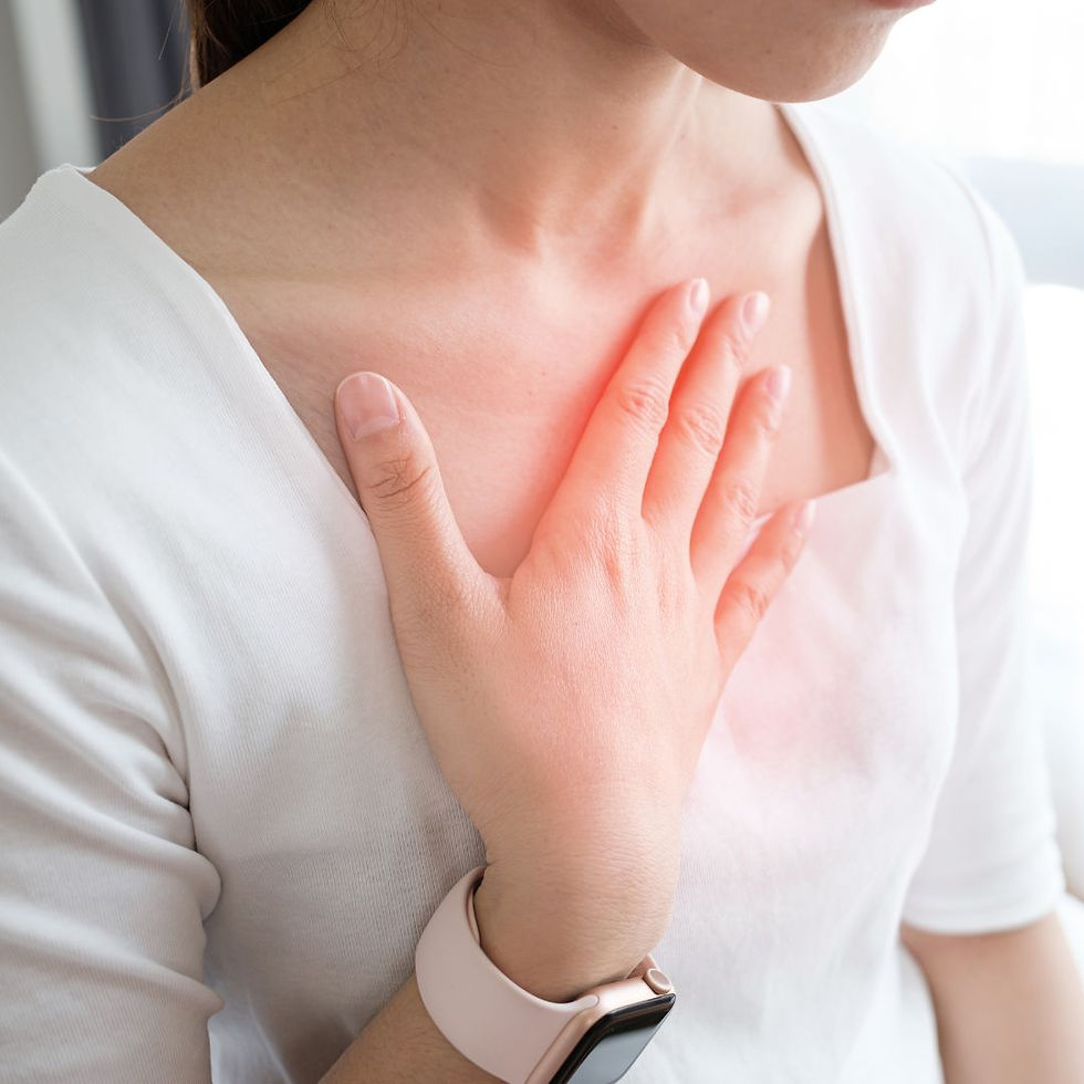 A woman sitting on a couch with strong posture, not defeated.
Or a hand over the heart, soft focus.