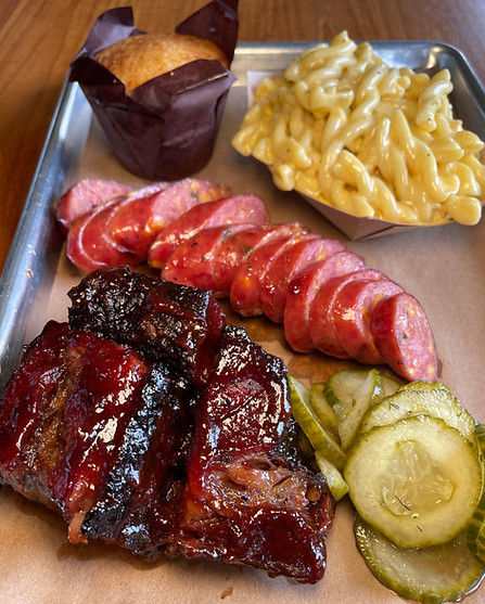 NEVS Barbecue platter of ribs, sausage, and mac and cheese