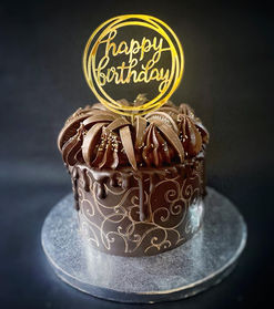 Chocolate Birthday Cake with gold decoration luxury 