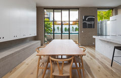 dining room design with feature glass door into rear yard