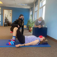 Kayla working with clients during the pandemic.