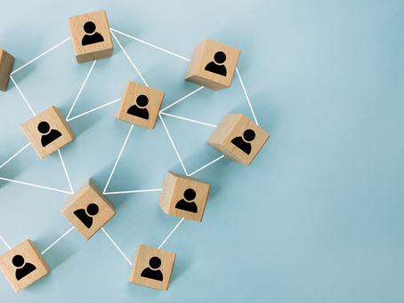 Connecting people, partnership, social media networks concept on blue background using wooden blocks. Digital communication, teamwork, network and community concept.