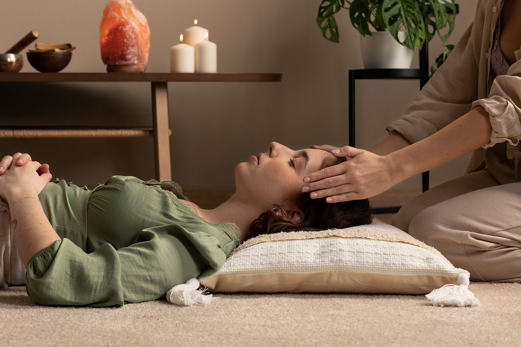 person-conducting-reiki-therapy.jpg