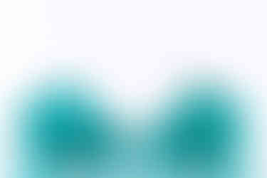 Monofiore Balloton vases pictured in five sizes in Paraiba green by Venini