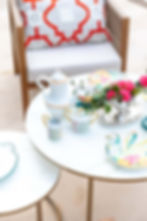 Bistro table featuring the Haviland & Parlon Garden Party collection, including the tea set and dessert plates