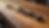 Eye-level view of clip-in hair extensions on a wooden surface