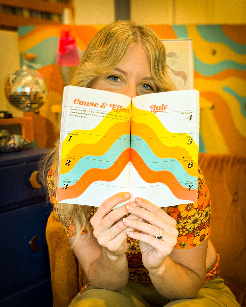 Thumbnail: 12 Laws of the Universe 2024 Planner