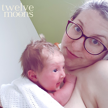 woman skin to skin with newborn after a home birth
