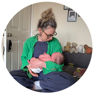 doula holding a newborn_edited.png