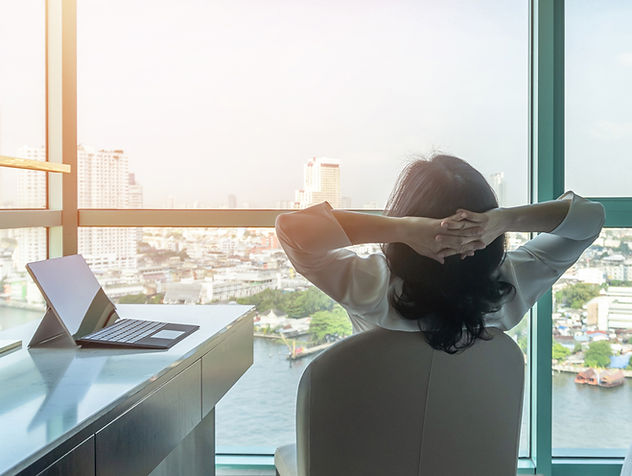 Person Stretching in an Office