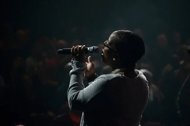 a singer singing and showing her skills to audience