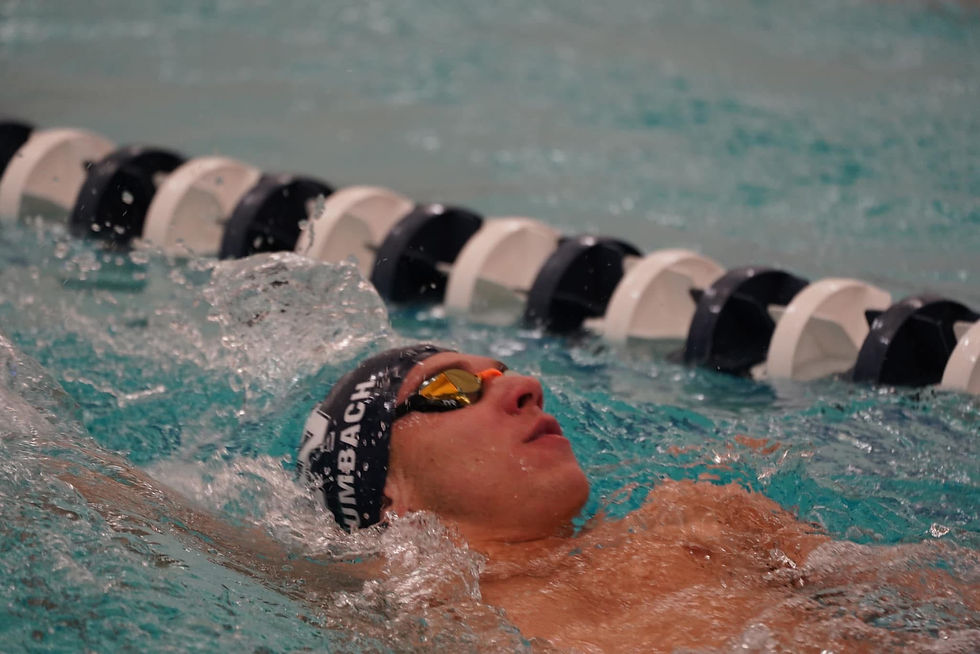 Eye-level view of a swimmer executing the butterfly stroke