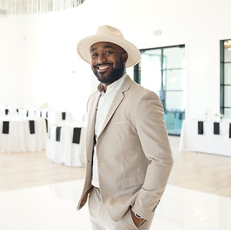 Ray Boyer bilingual wedding DJ Austin TX smiling at wedding reception