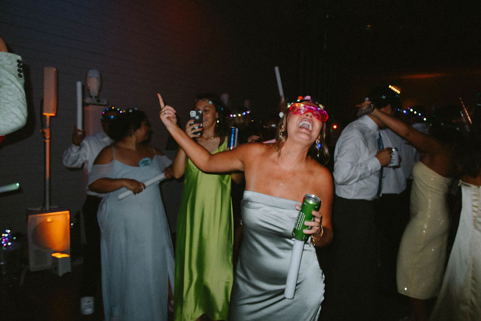 Wedding guests dancing at Austin reception Krystal Collective
