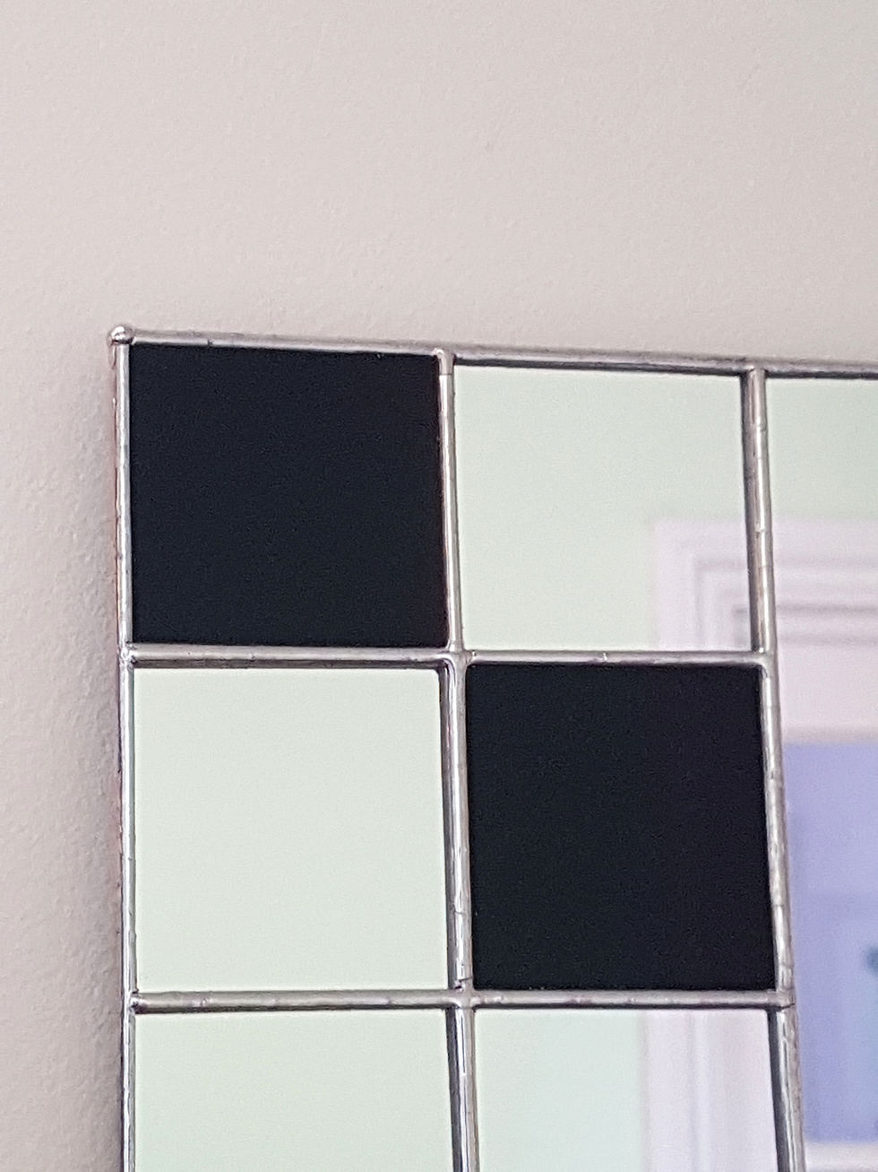 Thumbnail: Art Deco rectangular mirror showing detail of black stained glass