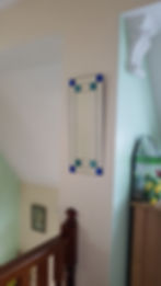 Small Art Deco mirror with teal and blue stained glass