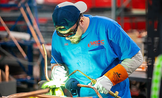 Image of KCC Team Member working on unit at Manufacturing Day event
