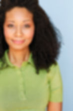 Aliza headshot in a lime green polo shirt