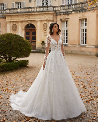 sleeve wedding dress in bridal boutique in Warwickshire