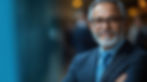 vecteezy_a-professional-man-smiles-confidently-while-engaging-in_48745801.jpg