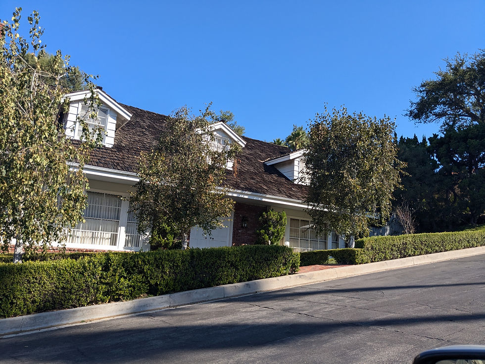 Beautiful Laurelwood home with lush landscaping and a well-maintained exterior