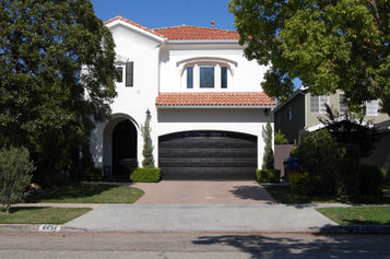Front view of a condo in Studio City, featuring clean architectural lines and manicured landscaping in a desirable residential setting.