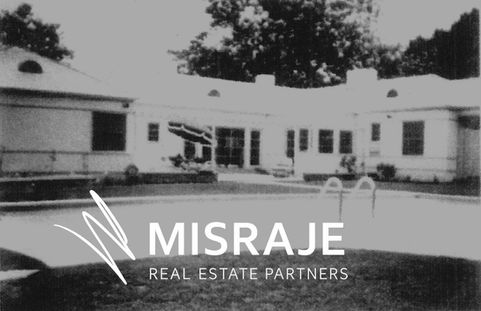 Original single-level ranch residence in Fryman Estates with minimal landscaping, circa 1940s