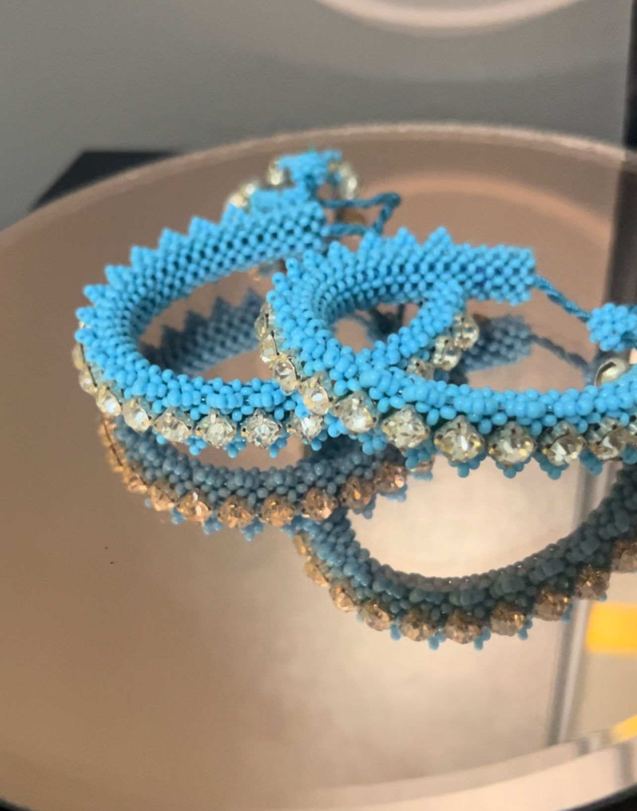 2 Beaded bangles by Crichet: Crafted Threads of Resilience.