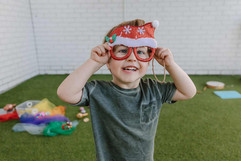 Boy with novelty Christmas glasses