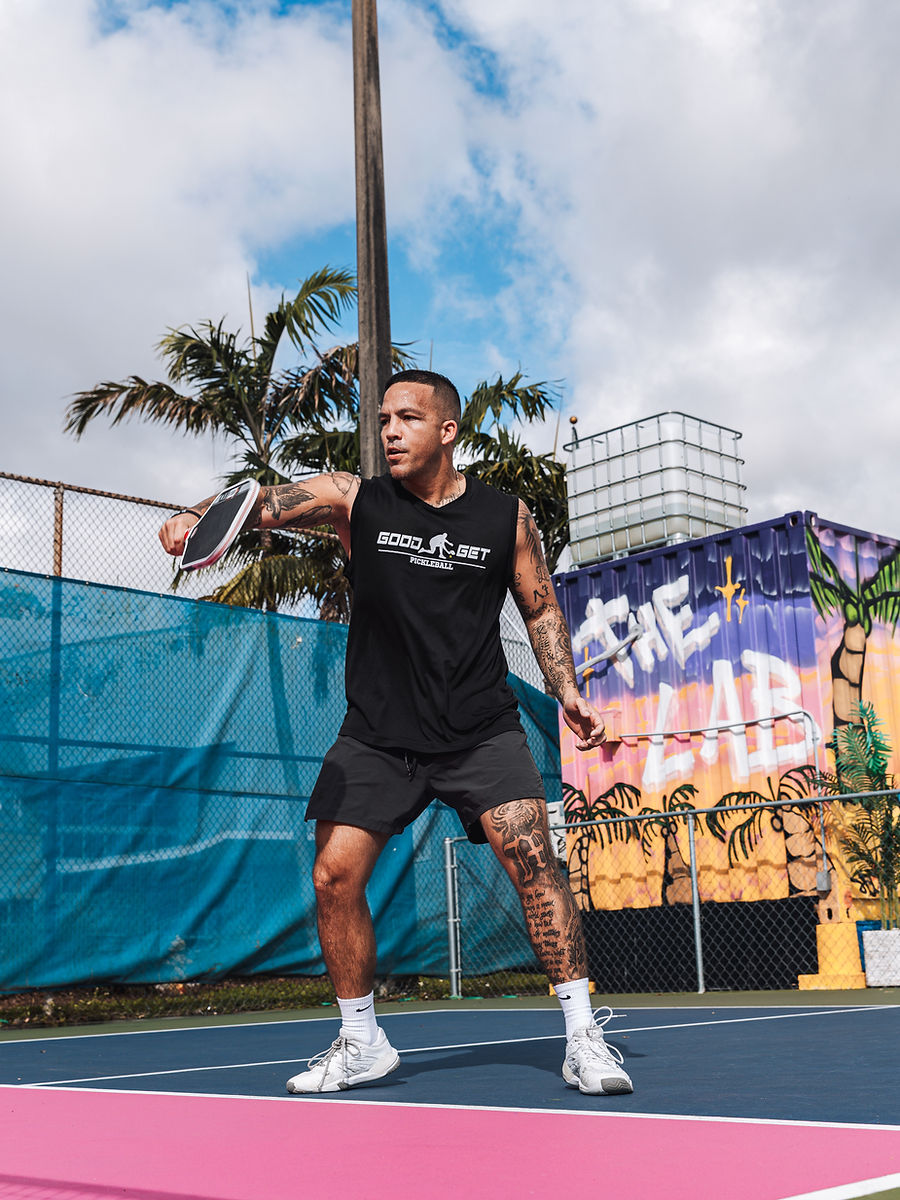 A player ready in front of The Lab mural